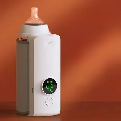 Chauffe Biberon Nomade BabyMilkDispe Blanc - Pratique et Compact - Duniversbebe.com