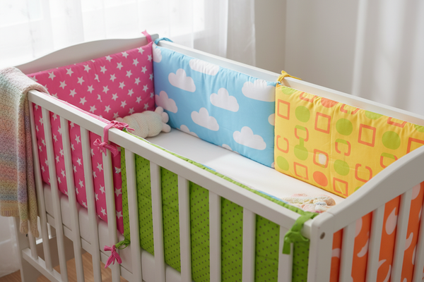 Tour de lit bébé  multicolore 